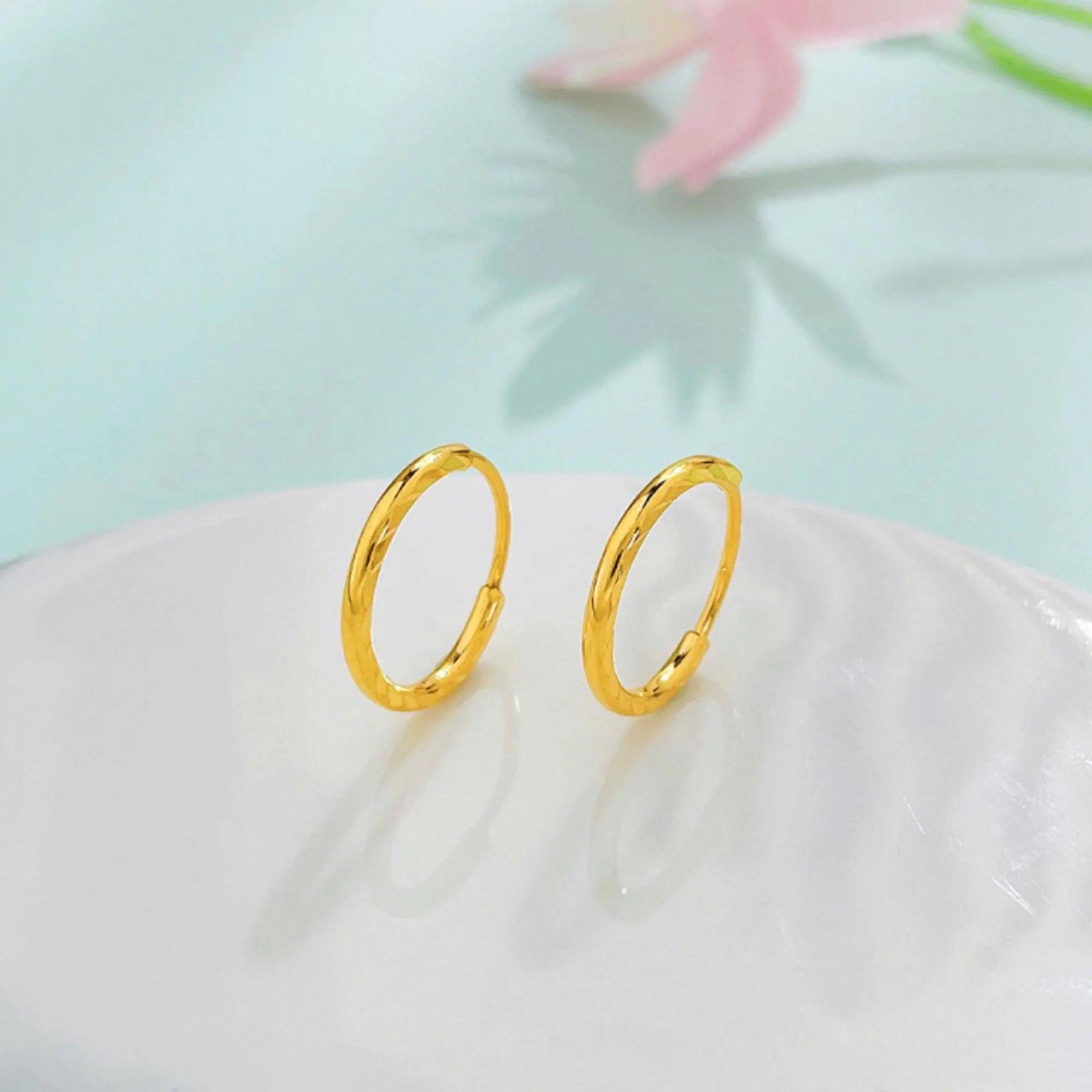Luxurious 24K Gold Minimalist Wave Hoop Earrings for Elegant Women.