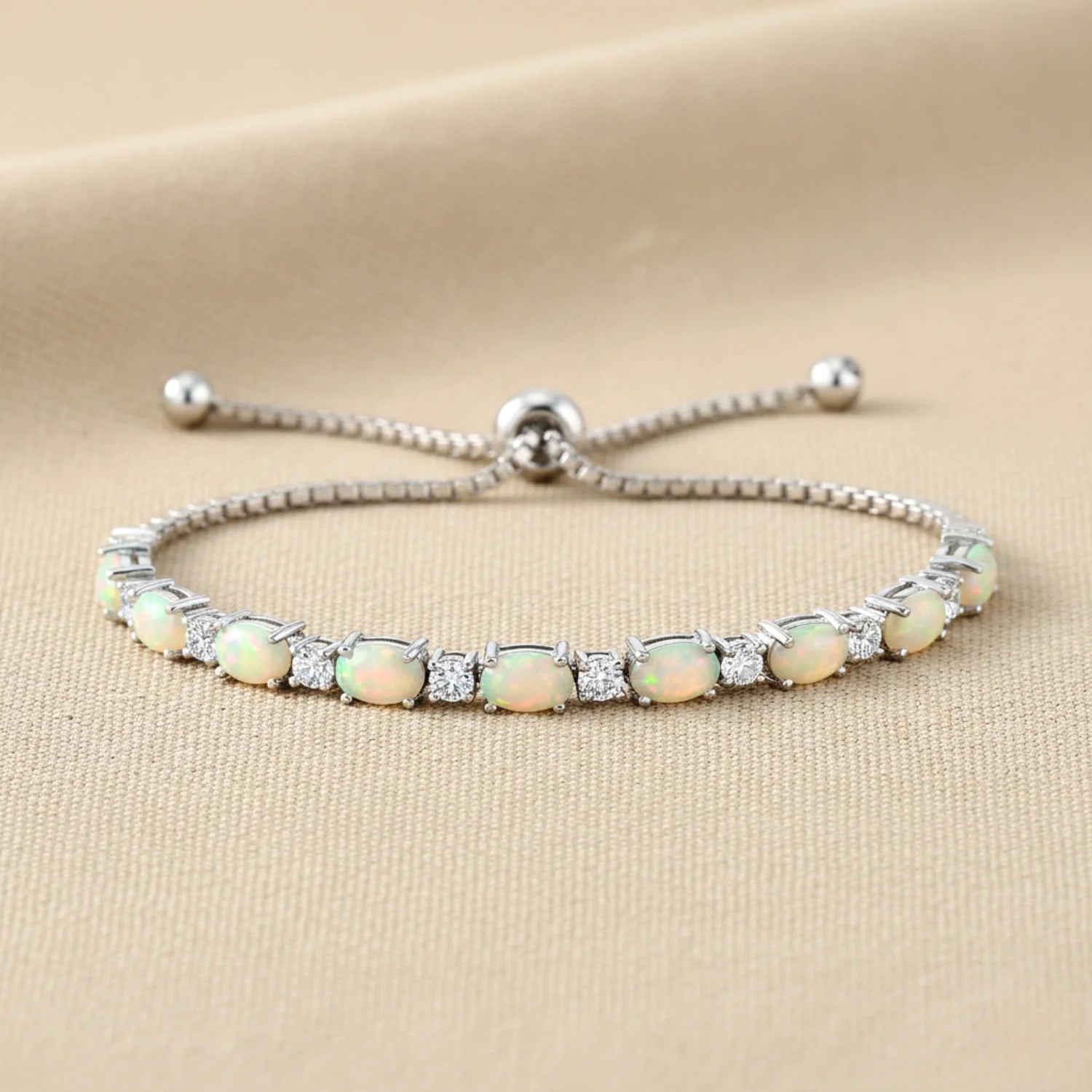 Sterling Silver Fire Opal Adjustable Bracelet with Cubic Zirconia Stones
