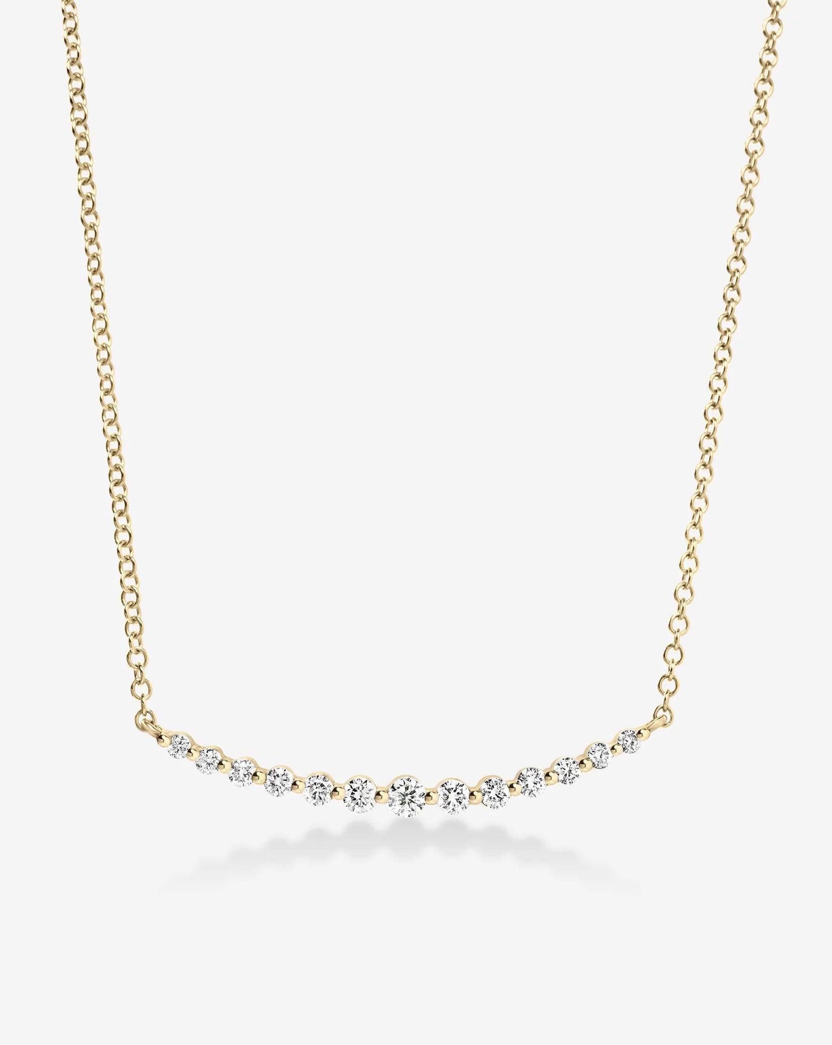 Exquisite Graduated Single Prong Diamond Necklace for Timeless Elegance.