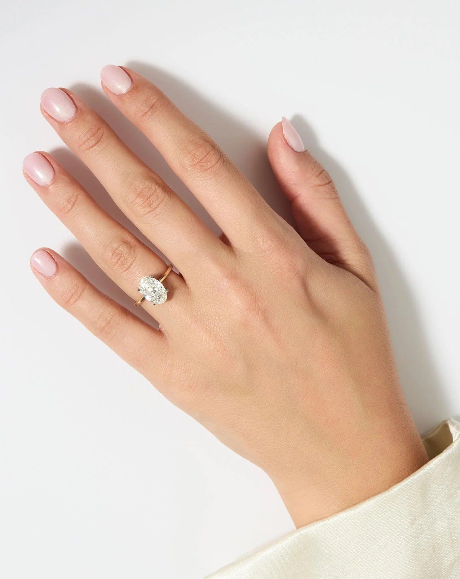 Stunning 4.53 Carat Oval Lab Diamond in Whisper Thin® Setting.