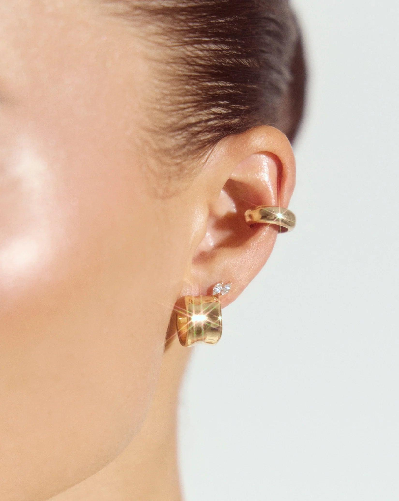 Elegant Liquid Gold Earrings – Elevate Your Style.