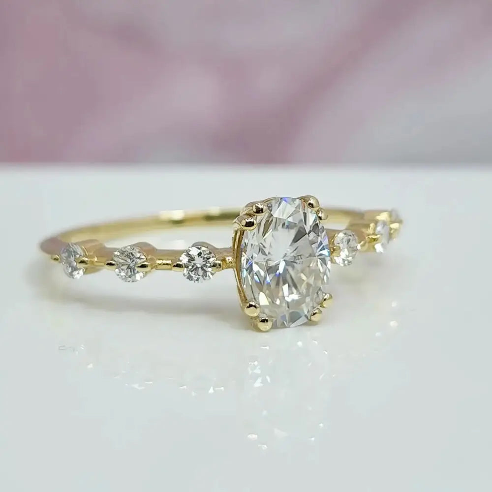 1 Carat Oval Cut Lab Grown Diamond Engagement Ring in 14K Yellow Gold.