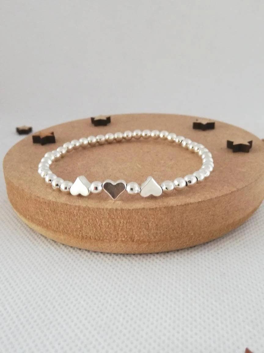 Charming Silver Heart Stretch Bracelet - Perfect Beaded Stacking Gift for Girlfriend or Teacher.