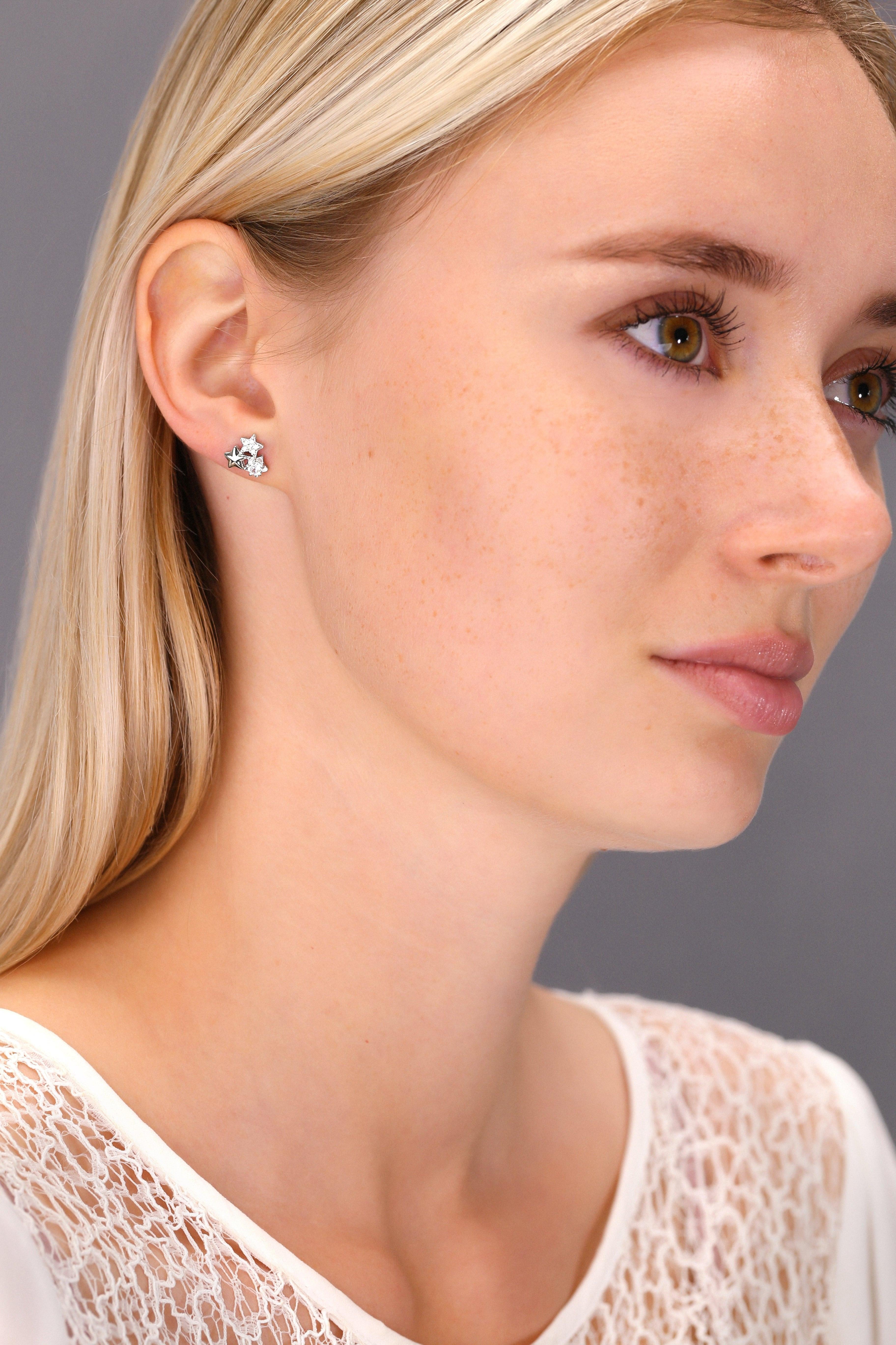 Glamorous Sterling Silver CZ Star Stud Earrings – Triple Star Design.