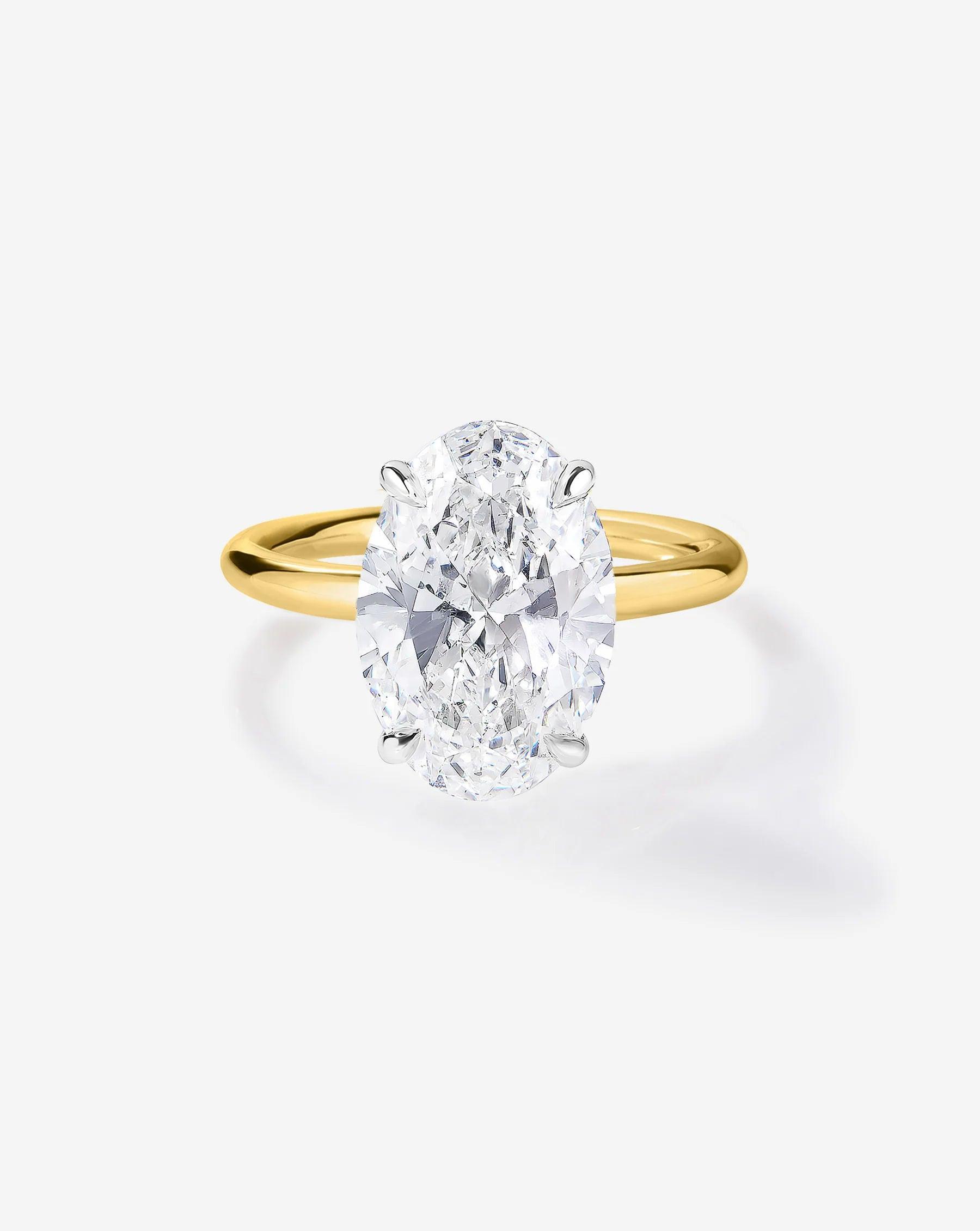 Stunning 3.85 Carat Oval Lab Diamond Cloud Solitaire Engagement Ring.