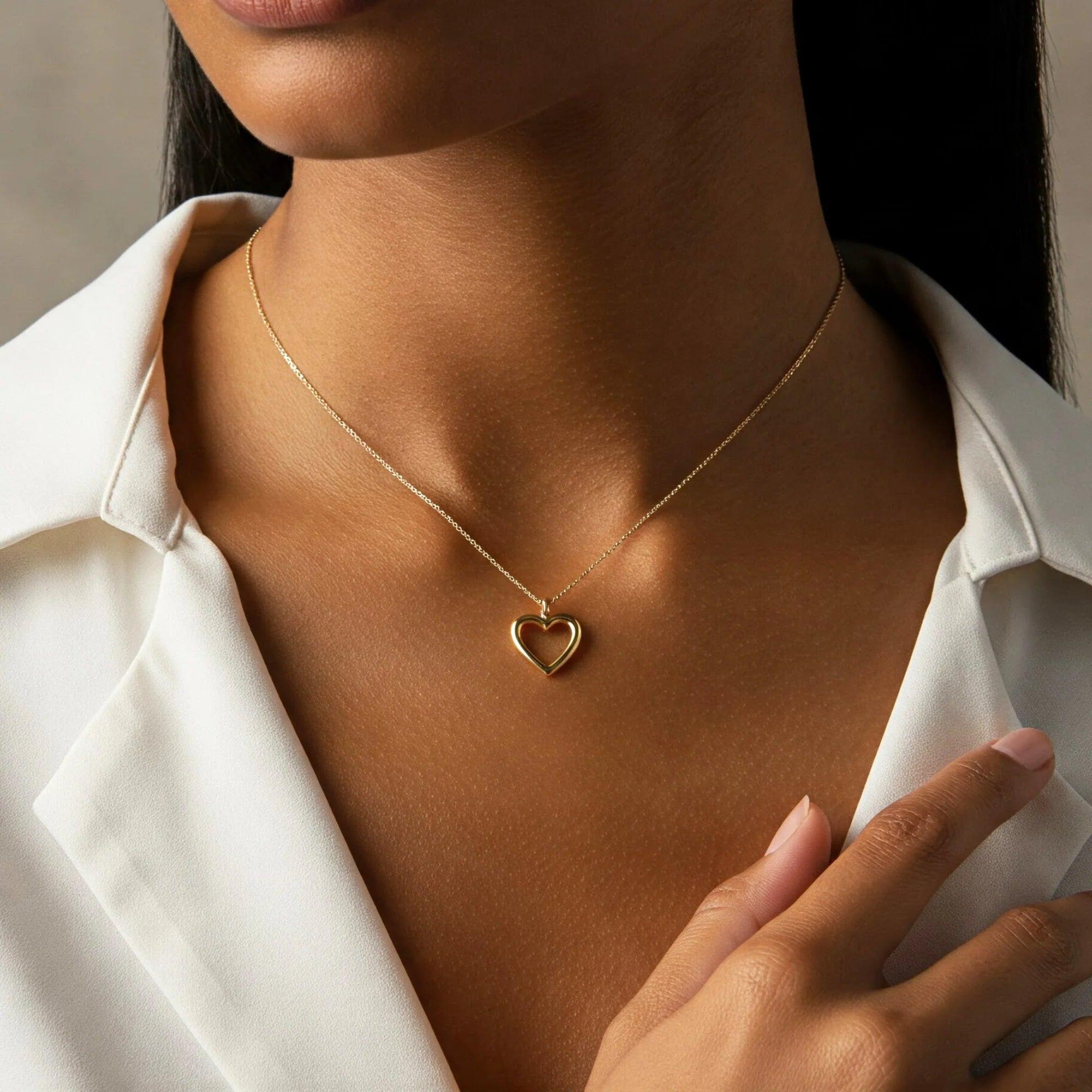 Elegant 14K Yellow Gold Heart Pendant Necklace with 18" Cable Chain.