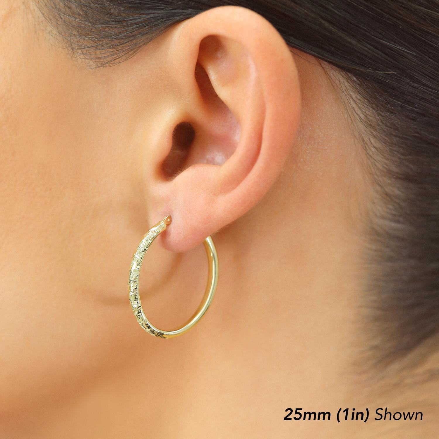 Stunning 14K Solid Gold Oval Hand-Engraved Tornado Pattern Diamond Cut Hoop Earrings.