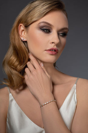 Elegant Gold Slider Bracelet with Dainty Pear-Shaped Cubic Zirconia for Women and Girls.