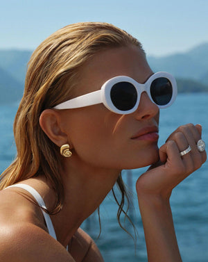 Elegant Nautilus Shell Earrings for a Coastal Chic Look.