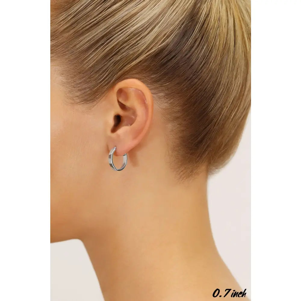 14K White Gold Elegant Small Oval Hoop Earrings - 0.7 Inch Classic Shine.