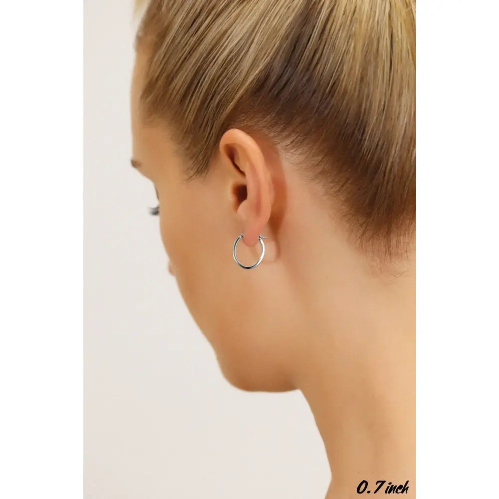 14K White Gold Elegant Small Oval Hoop Earrings - 0.7 Inch Classic Shine.