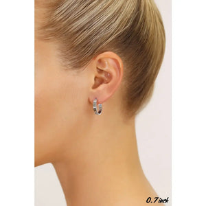 14K White Gold Elegant Small Oval Hoop Earrings - 0.7 Inch Classic Shine.