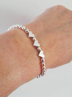 Charming Silver Heart Stretch Bracelet - Perfect Beaded Stacking Gift for Girlfriend or Teacher.