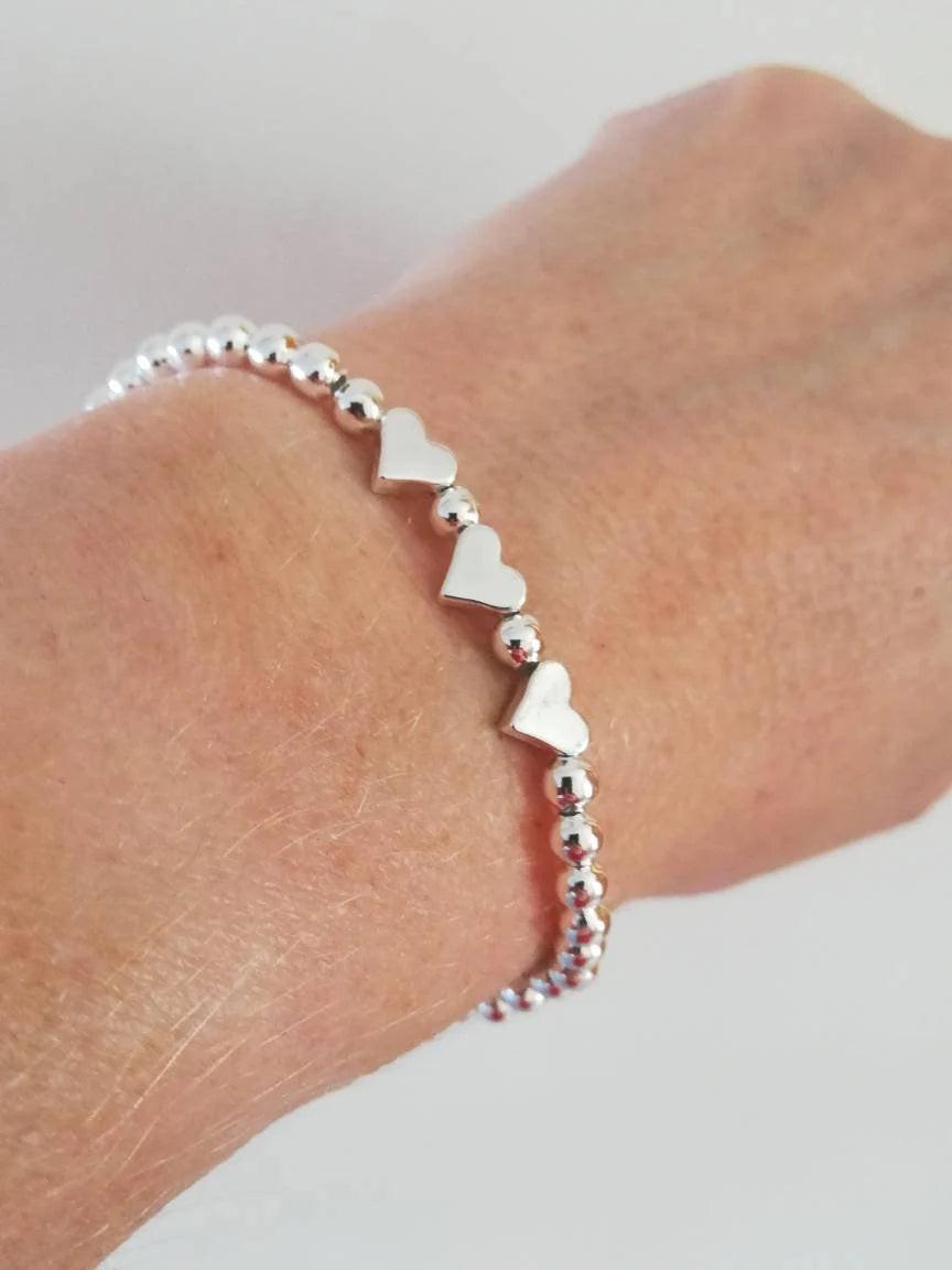 Charming Silver Heart Stretch Bracelet - Perfect Beaded Stacking Gift for Girlfriend or Teacher.