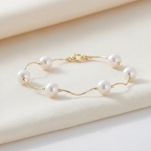 Elegant 14K Gold Handmade Freshwater Pearl High Polished Station Bracelet.