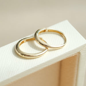 Dainty 14K Solid Gold Oval Hoop Earrings - Minimalist Skinny Huggie Hoops for Everyday Elegance.
