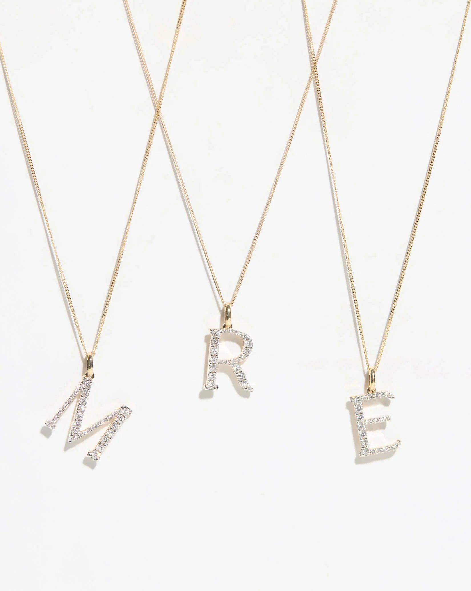 Exquisite Large Diamond Initial Pendant - Personalize Your Elegance.