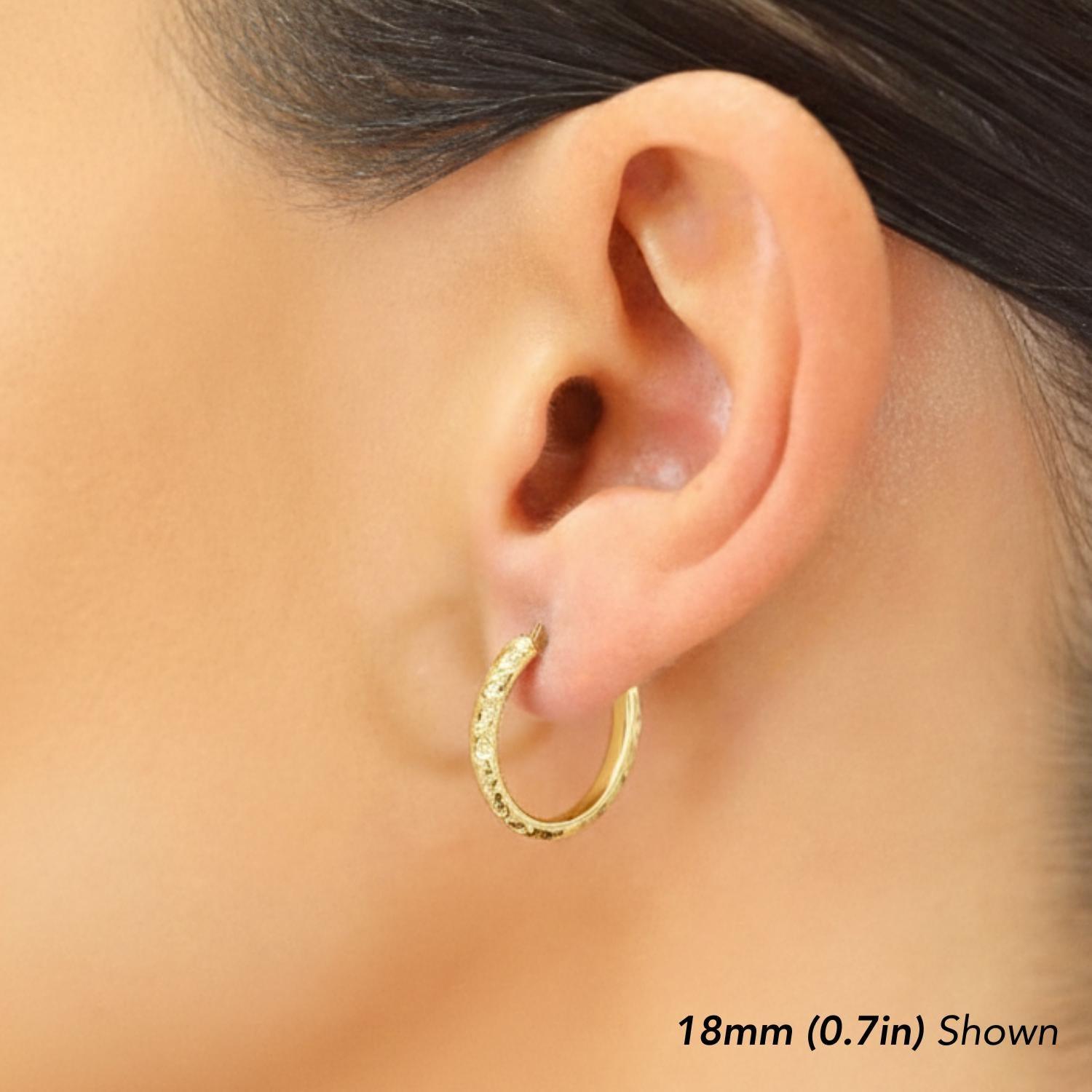 Stunning 14K Solid Gold Oval Hand-Engraved Tornado Pattern Diamond Cut Hoop Earrings.