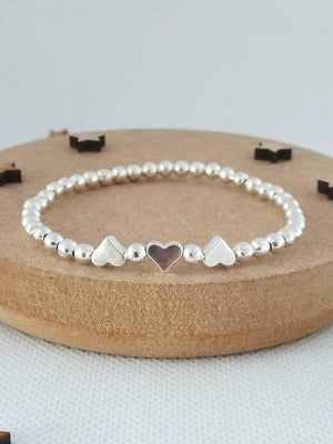 Charming Silver Heart Stretch Bracelet - Perfect Beaded Stacking Gift for Girlfriend or Teacher.