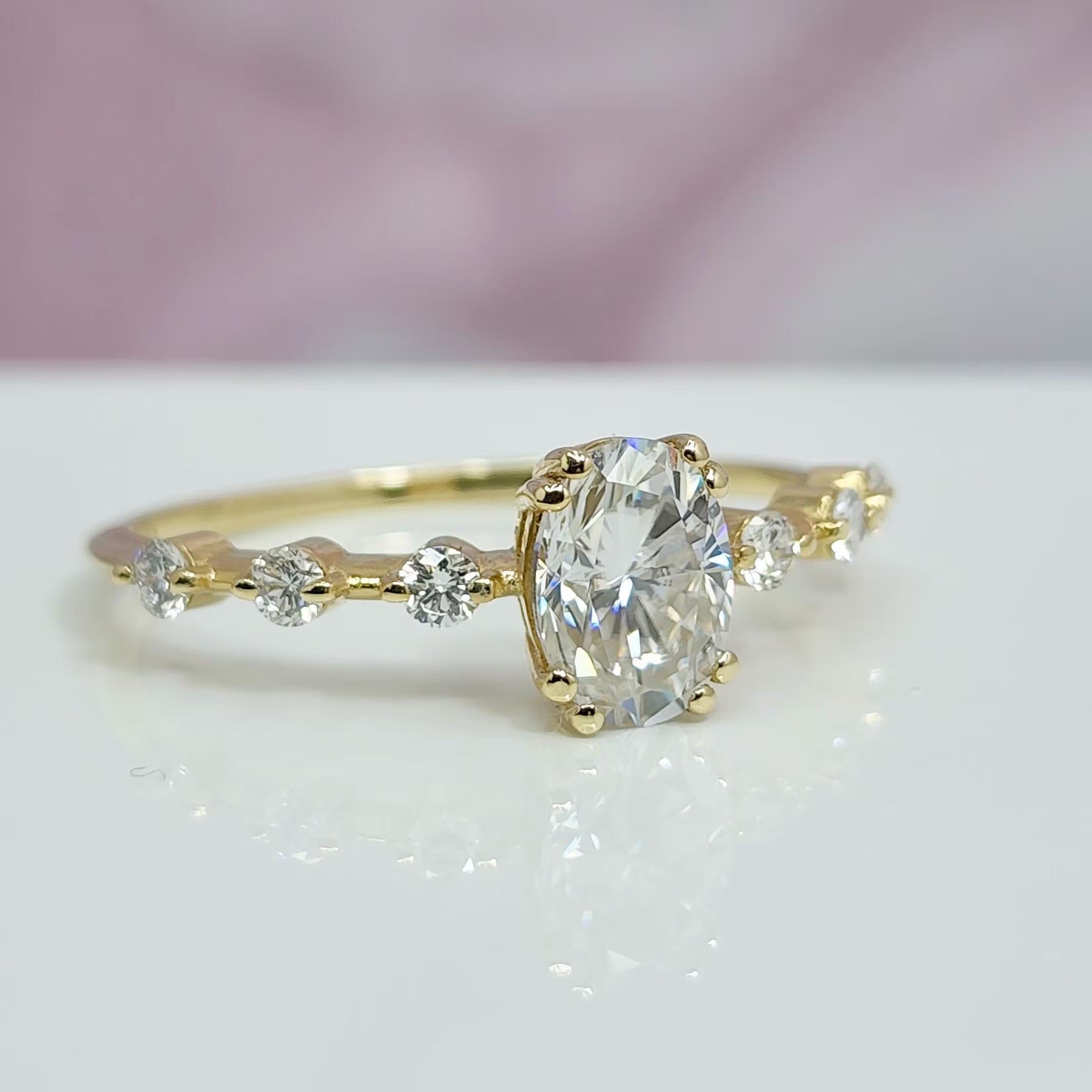 1 Carat Oval Cut Lab Grown Diamond Engagement Ring in 14K Yellow Gold.