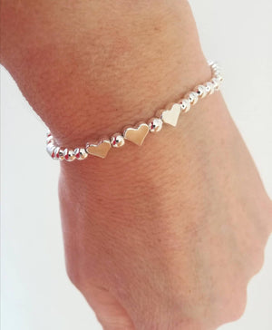 Charming Silver Heart Stretch Bracelet - Perfect Beaded Stacking Gift for Girlfriend or Teacher.