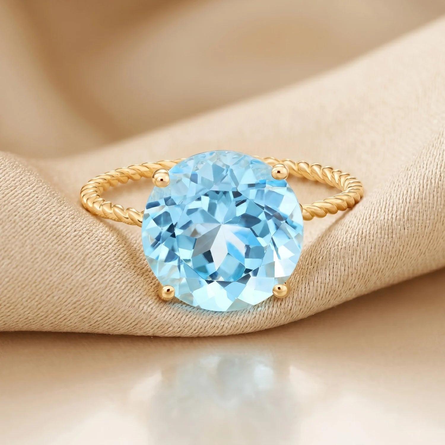 Stunning 14K Yellow Gold Sky Blue Topaz Ring - Perfect Birthday Gemstone Gift for Her!.