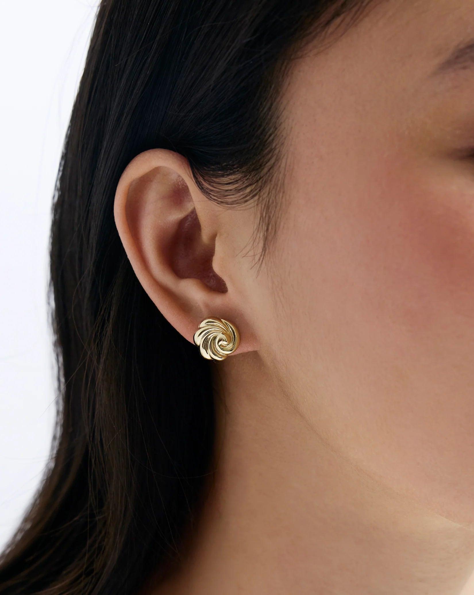 Elegant Swirling Studs - A Touch of Whimsy for Any Occasion.