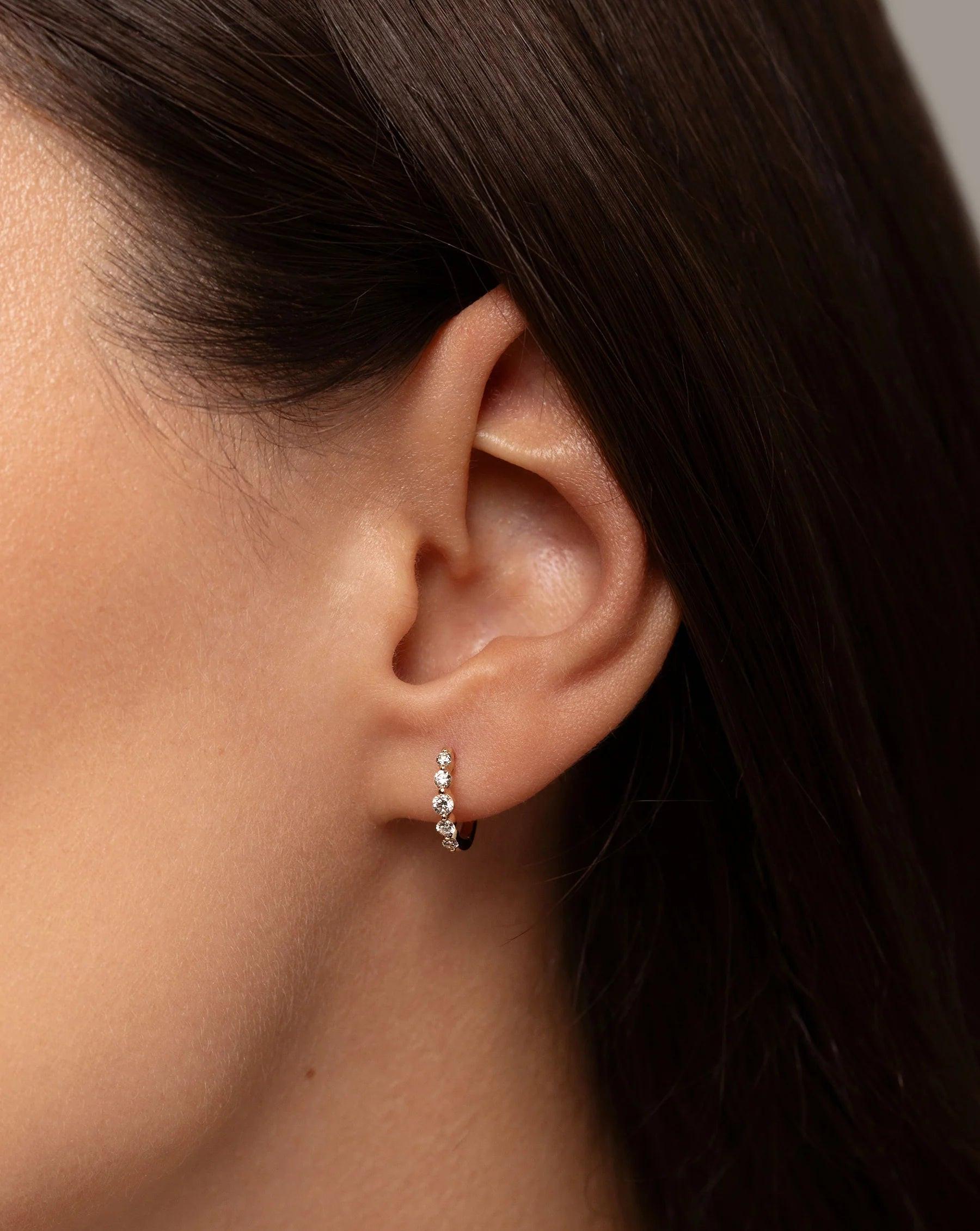 Stunning Graduated Diamond Huggie Earrings for Effortless Elegance.