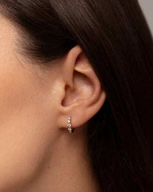 Stunning Graduated Diamond Huggie Earrings for Effortless Elegance.