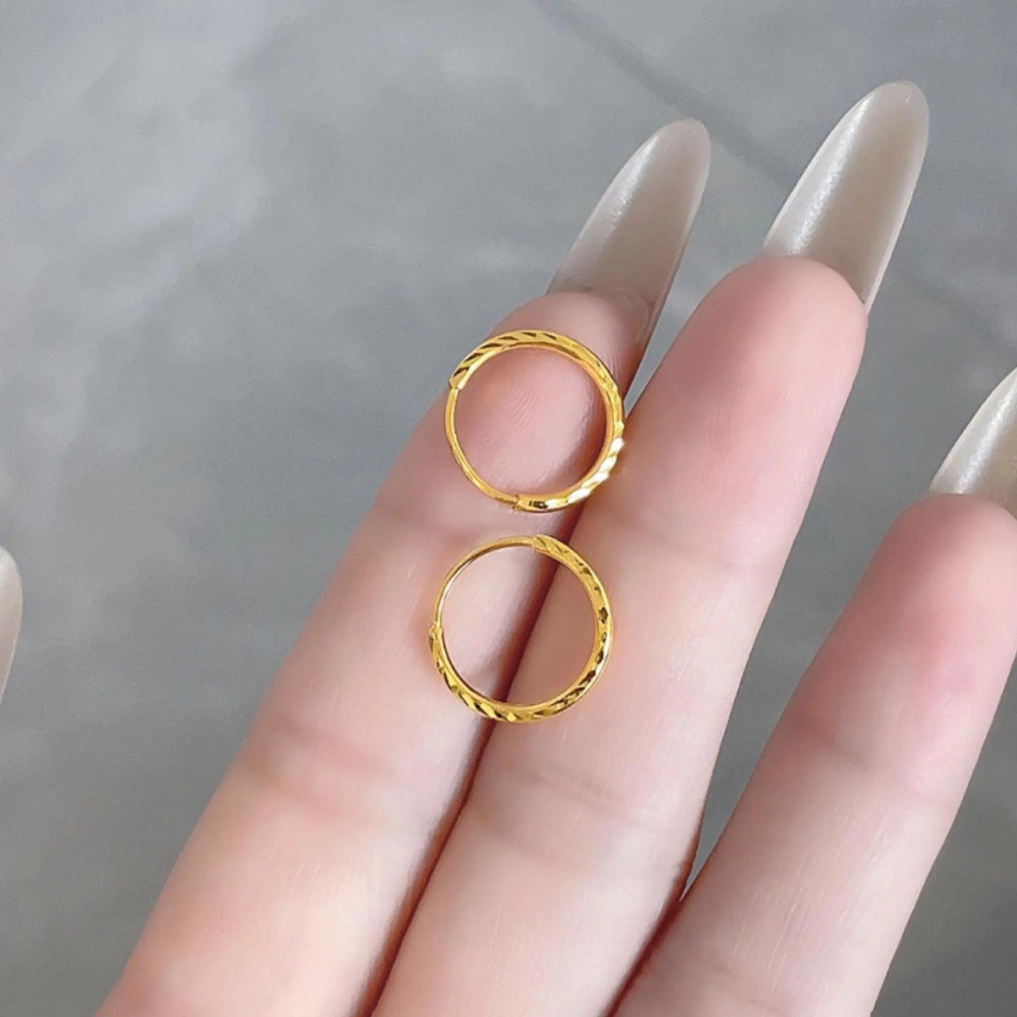 Luxurious 24K Gold Minimalist Wave Hoop Earrings for Elegant Women.