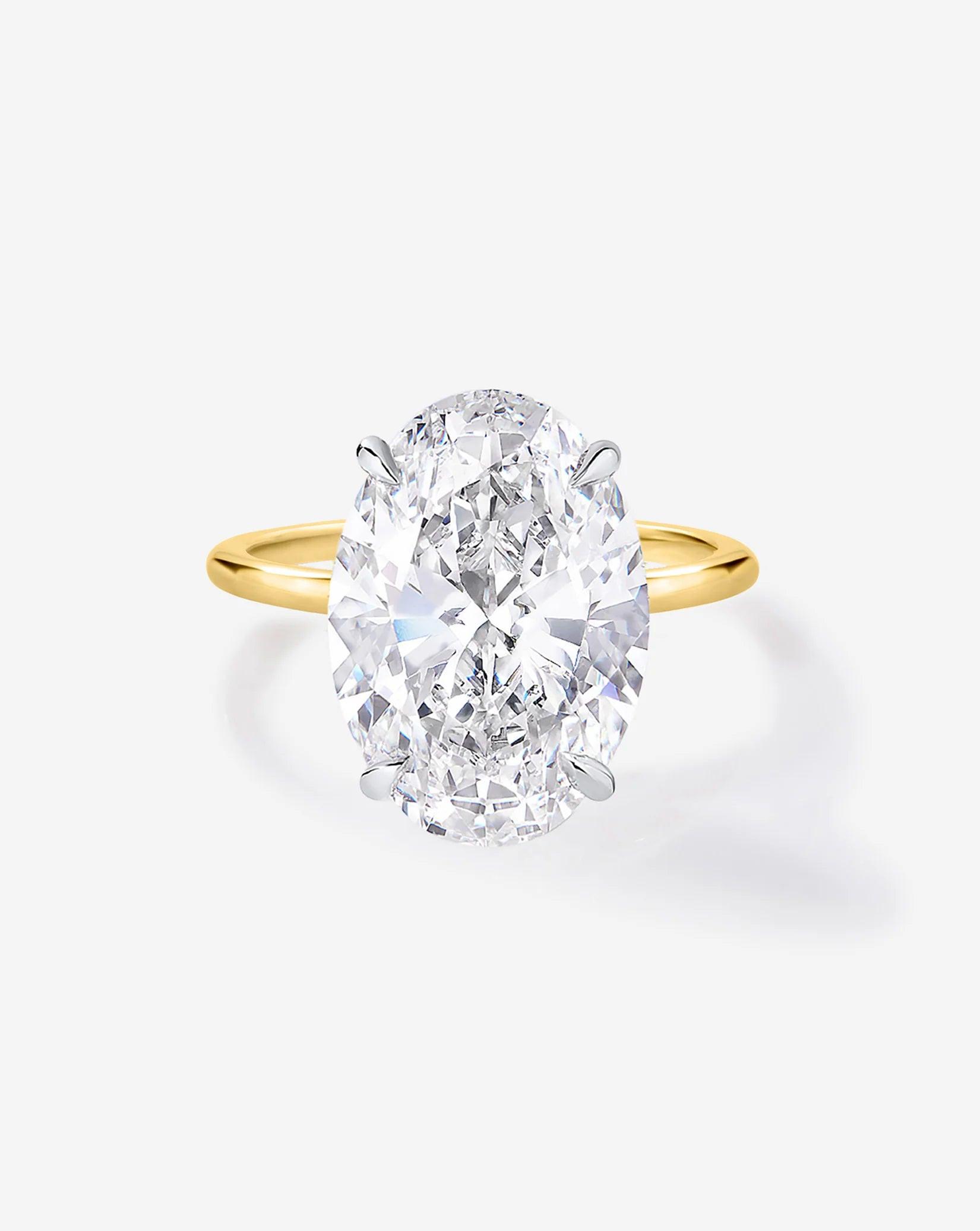 Exquisite 6.07 Carat Oval Lab Diamond in Whisper Thin® Setting.