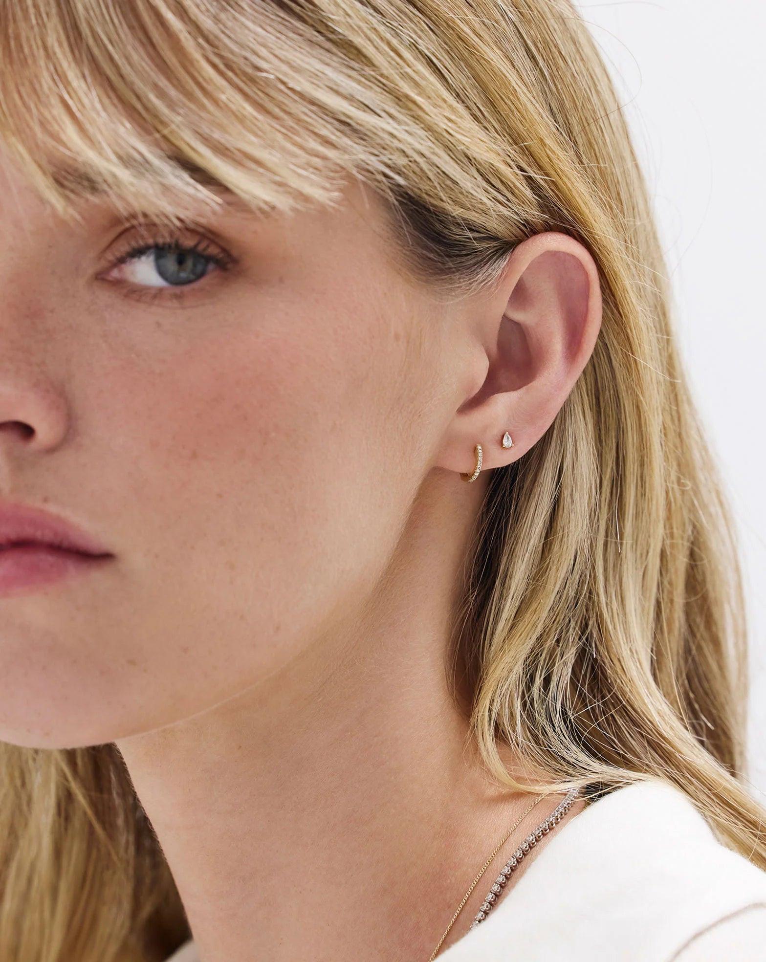 Charming Petite Diamond Huggie Earrings.