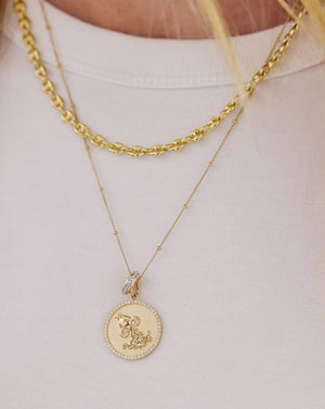 Stunning Saturn Chain Necklace - Elevate Your Style!.