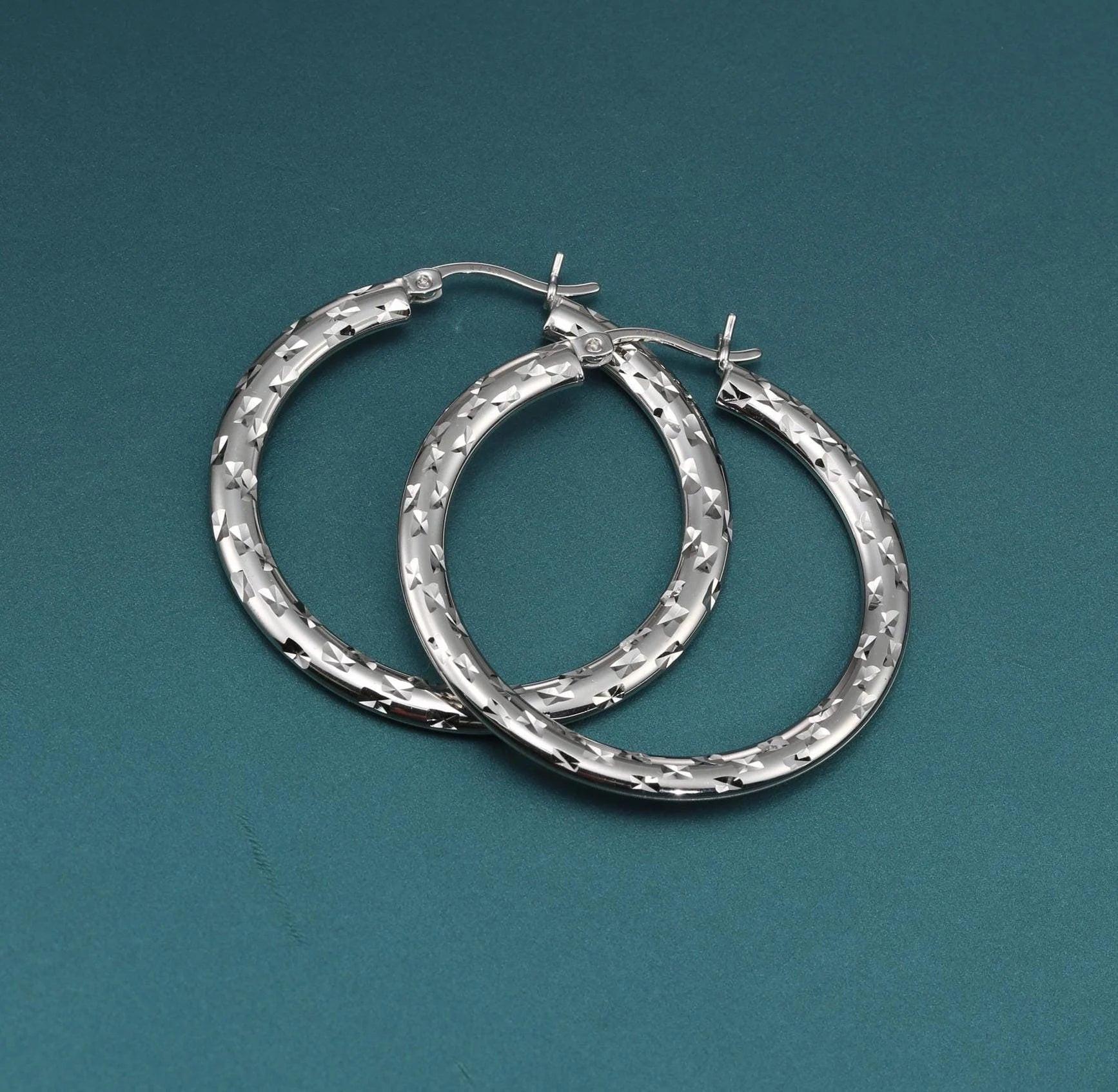 Elegant 35mm Sterling Silver Skinny Hoop Earrings.