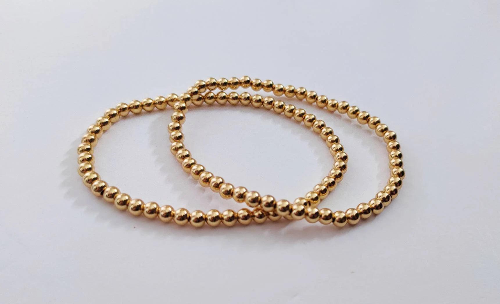 Elegant Gold Rose Silver Beaded Stacking Bracelets - 14K Gold Plated Elastic Design.