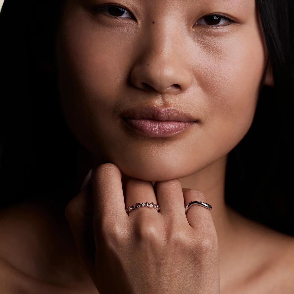 Stunning Silver Sunset Pear Band Ring - Elevate Your Style!.