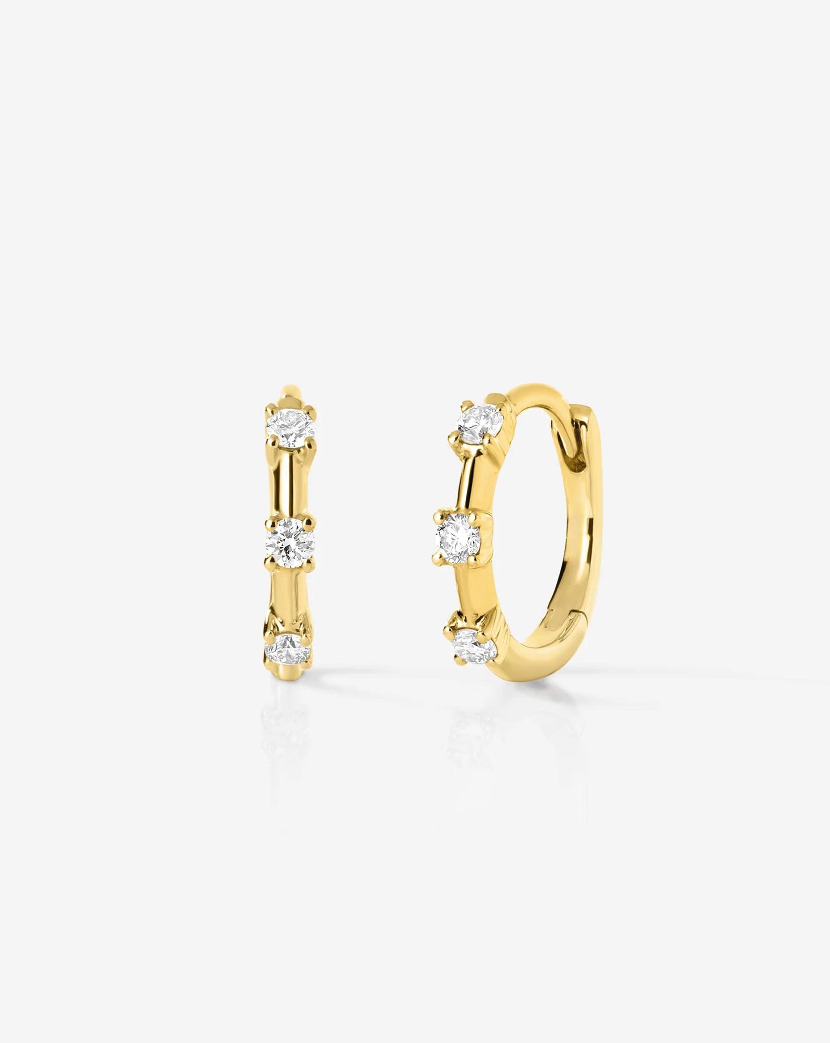 Sparkling Diamond Station Huggie Earrings - Elegant and Chic!.