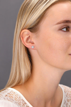 Elegant CZ Flower Stud Earrings in Sterling Silver - Timeless Sparkle for Any Occasion.