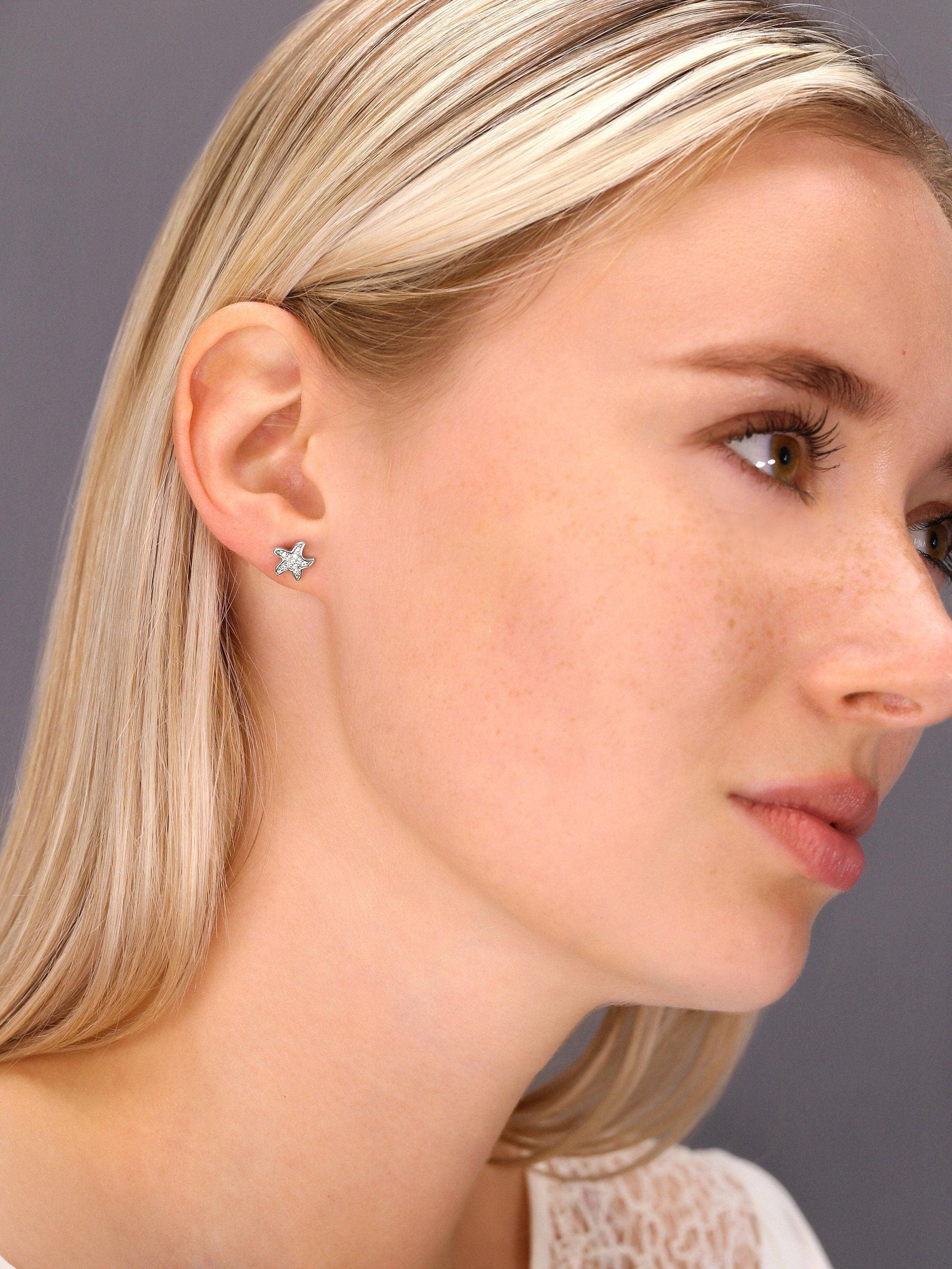 Sparkling CZ Starfish Stud Earrings in Sterling Silver.
