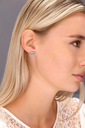 Dazzling CZ Sterling Silver Skull and Bones Stud Earrings.