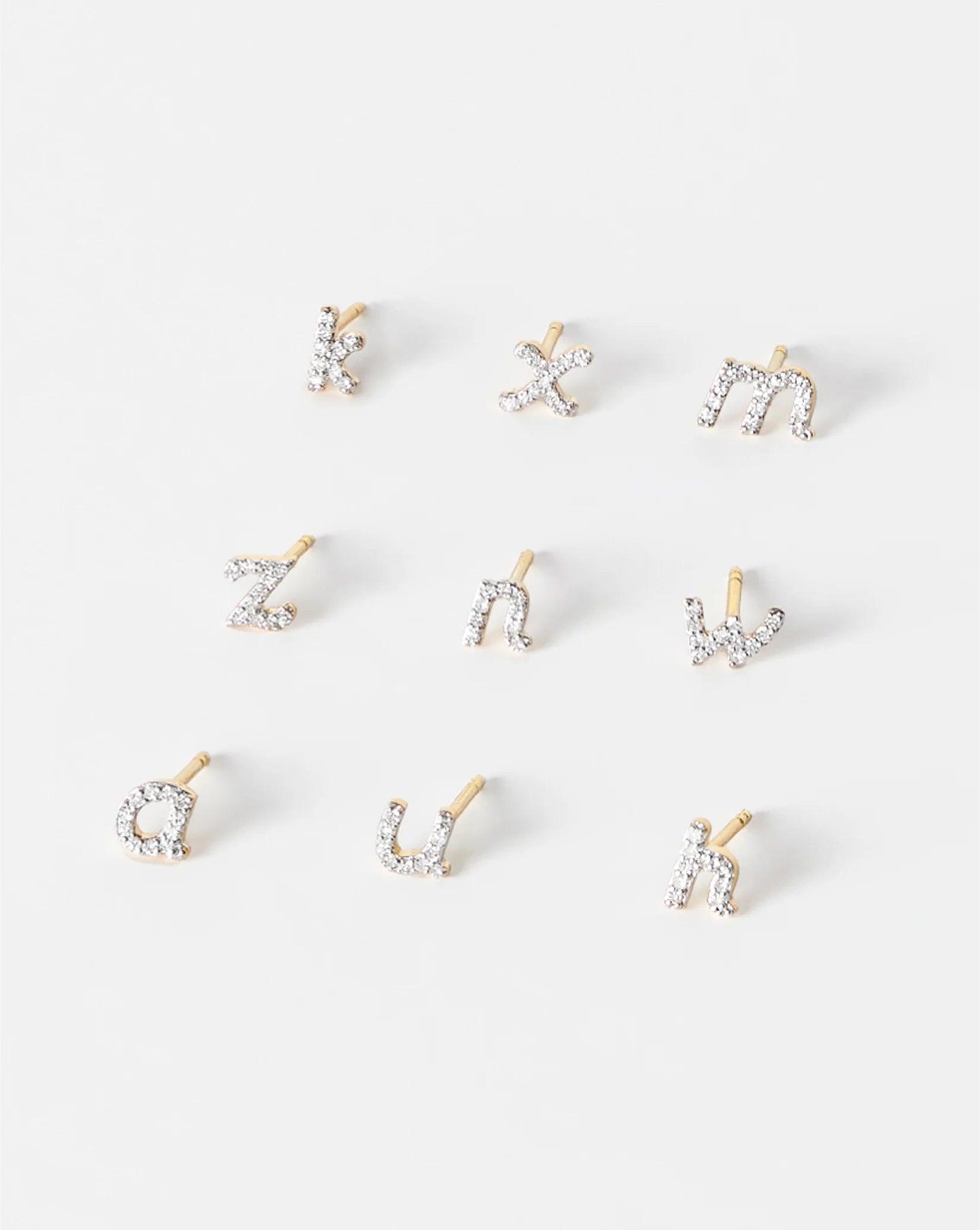 Sparkling Mini Letter Pavé Stud Earrings.
