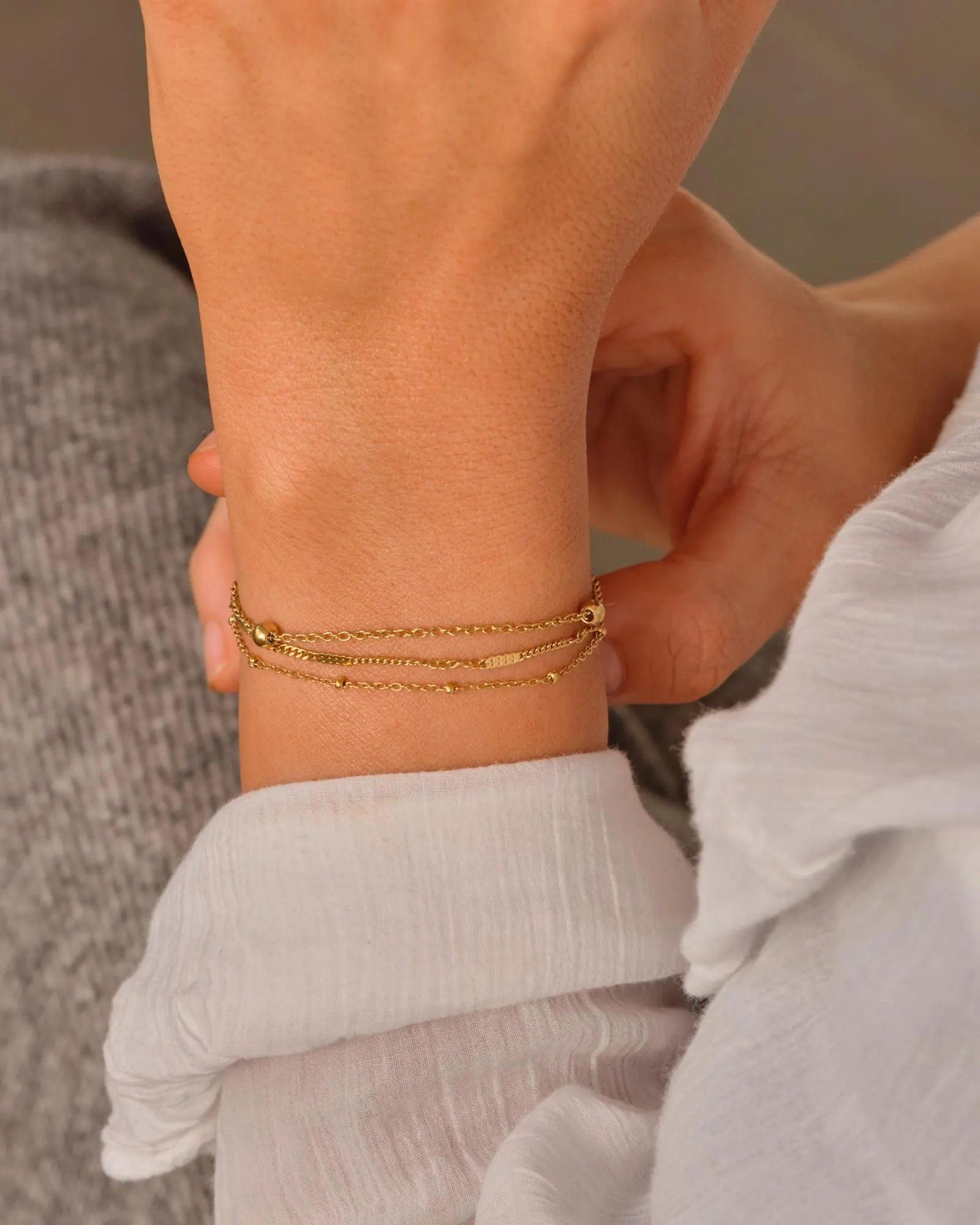 Elegant Waterproof Gold Stainless Steel Layered Bracelet - Dainty Stackable Design for Women.