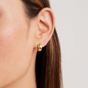 14K Solid Gold Chunky Huggie Earrings – Stylish Thick Hoops for Everyday Elegance & Special Occasions.