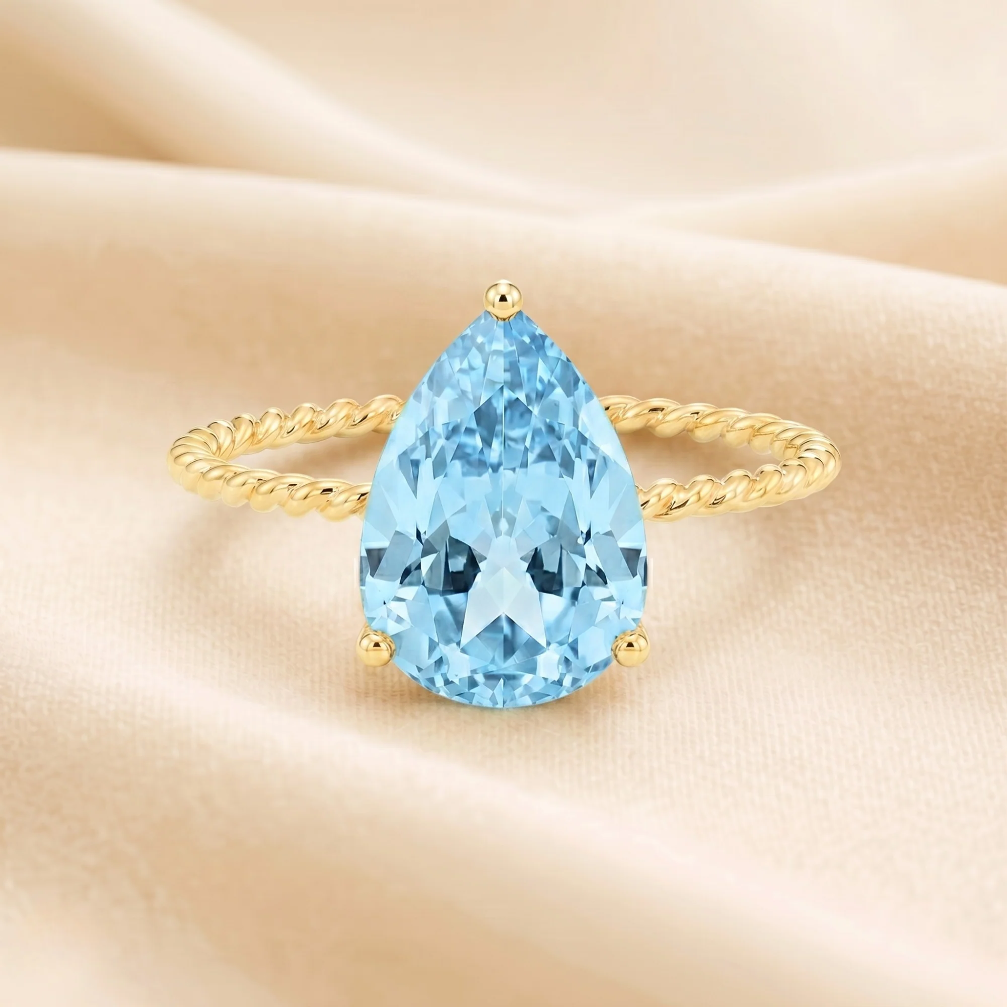 Stunning 14K Yellow Gold Pear-Cut Sky Blue Topaz Ring – The Perfect Elegant Birthstone Gift for Any Occasion.