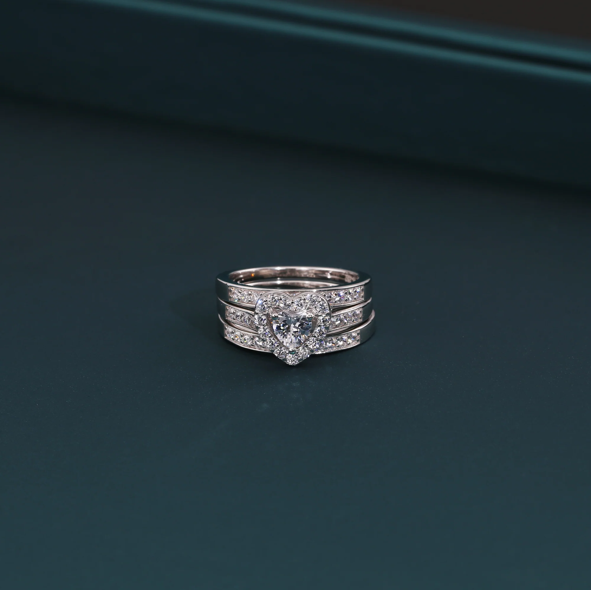 Radiant CZ Heart Three-Tier Engagement Ring Set in Sterling Silver - Perfect Bridal Ring Set for Proposals, Weddings, and Anniversaries.