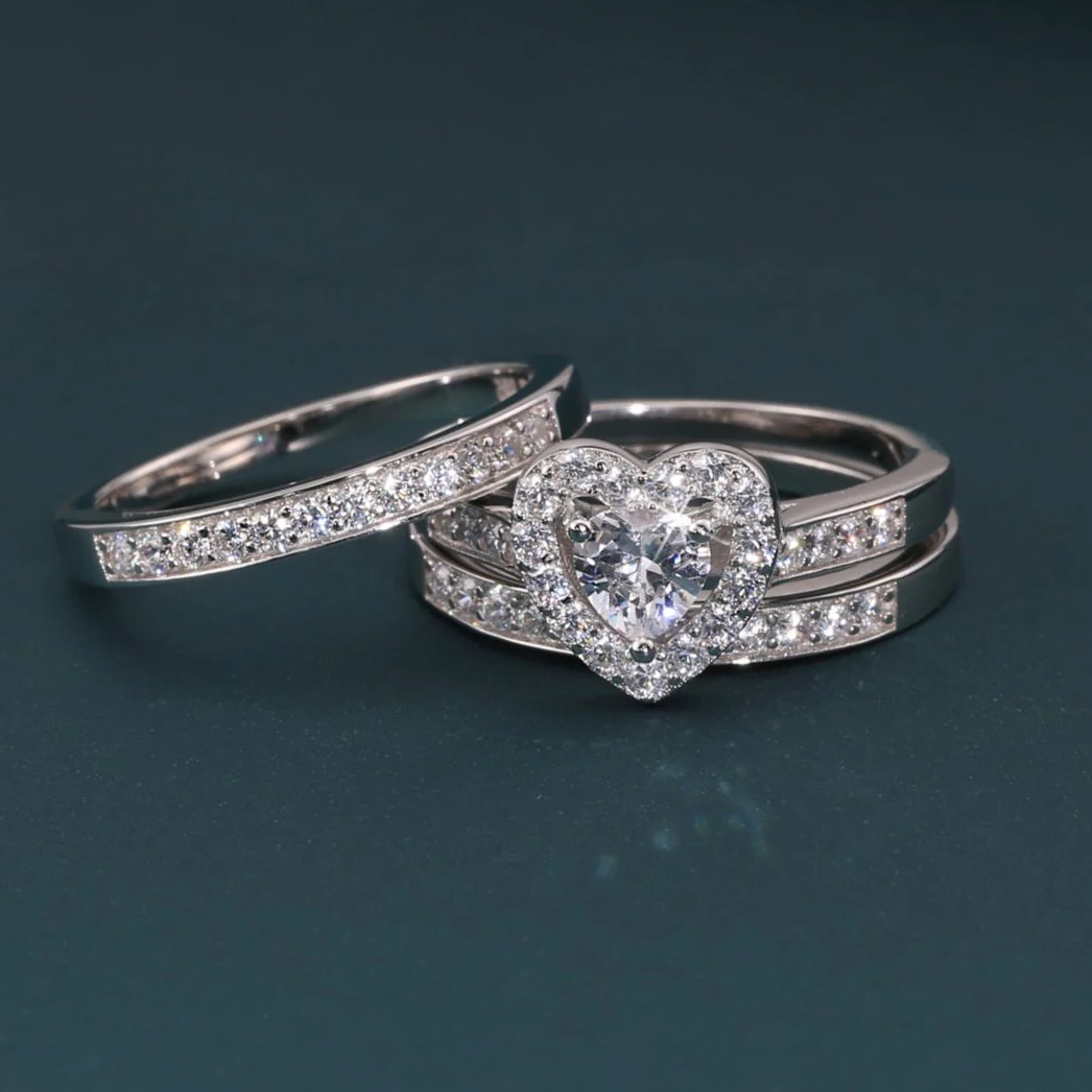 Radiant CZ Heart Three-Tier Engagement Ring Set in Sterling Silver - Perfect Bridal Ring Set for Proposals, Weddings, and Anniversaries.