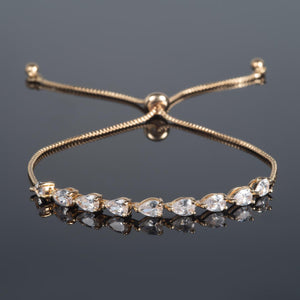 Elegant Gold Slider Bracelet with Dainty Pear-Shaped Cubic Zirconia for Women and Girls.