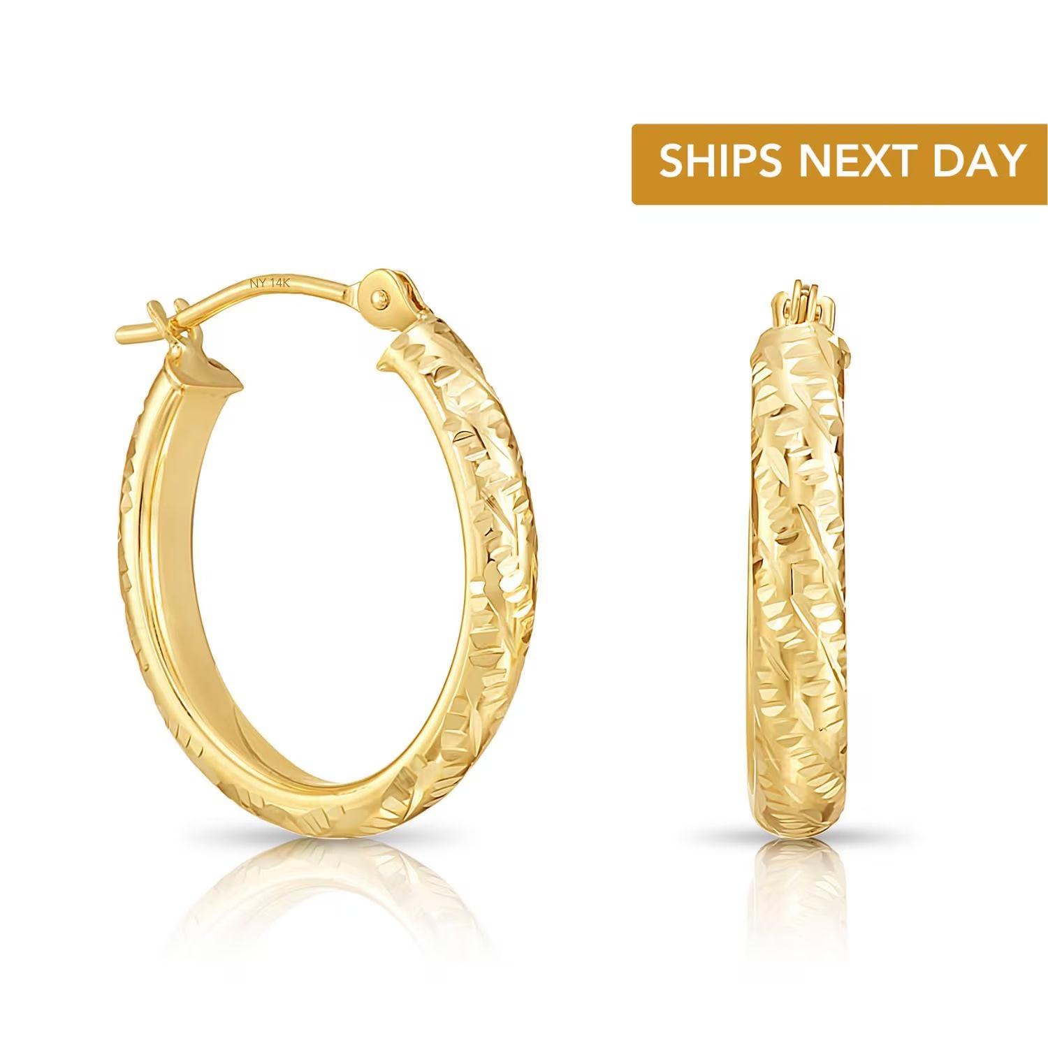 Stunning 14K Solid Gold Oval Hand-Engraved Tornado Pattern Diamond Cut Hoop Earrings.