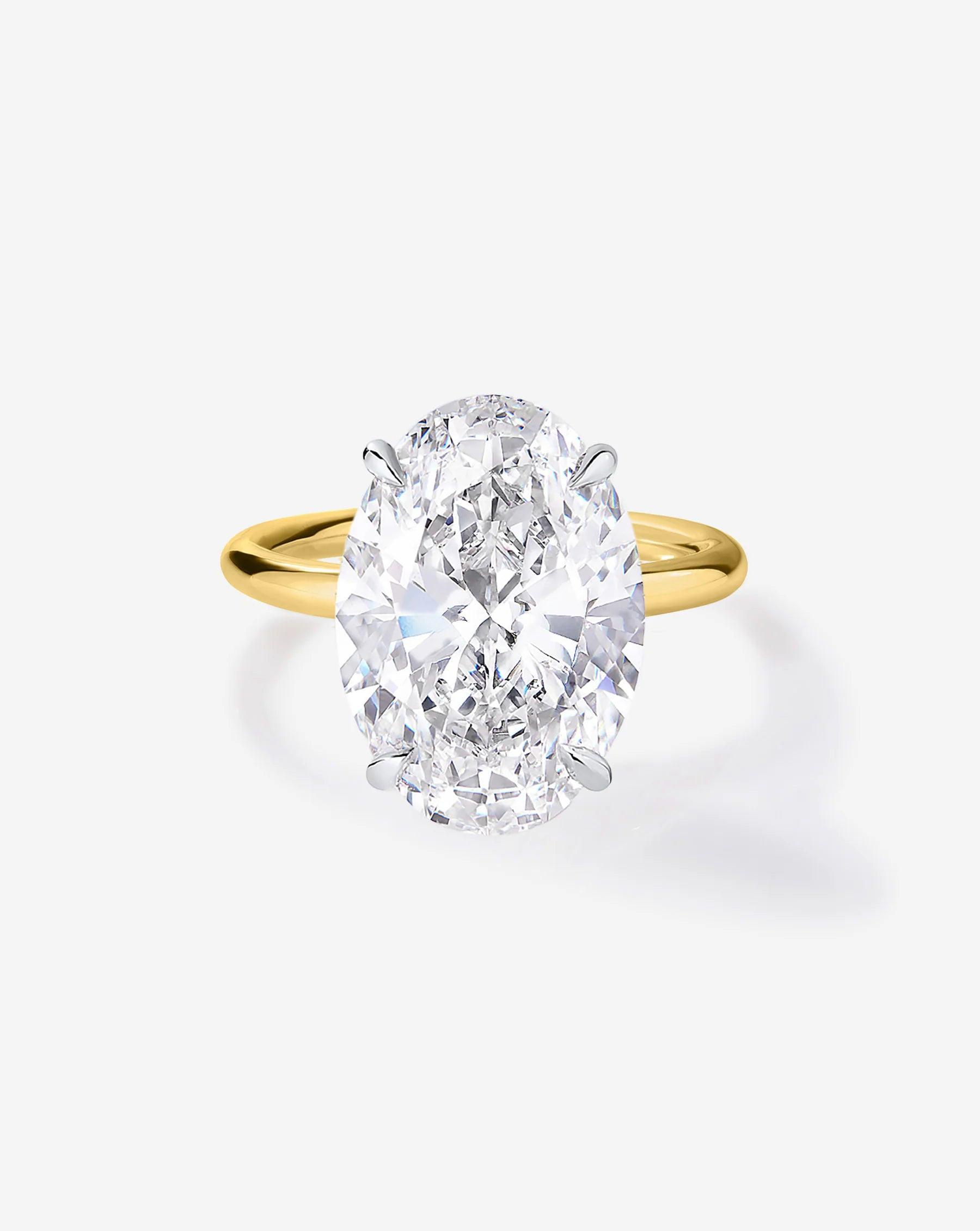Stunning 4.01 Carat Oval Lab Diamond Cloud Solitaire Ring.