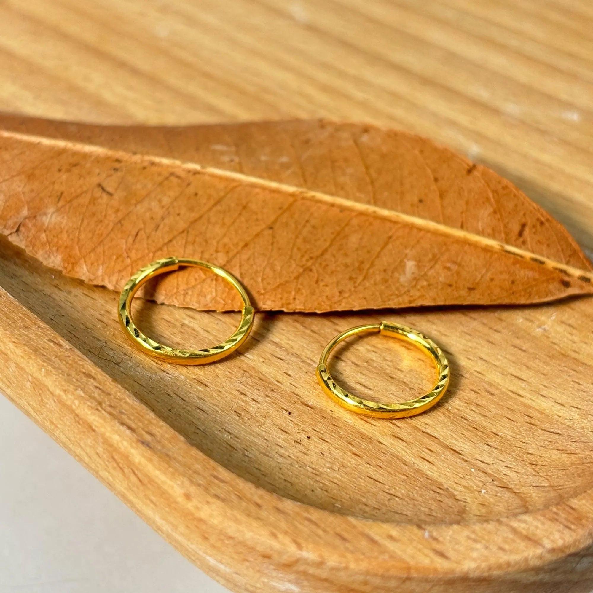Luxurious 24K Gold Minimalist Wave Hoop Earrings for Elegant Women.